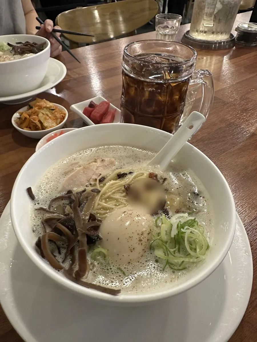 Tori paitan topped with wood ear mushroom and green onion