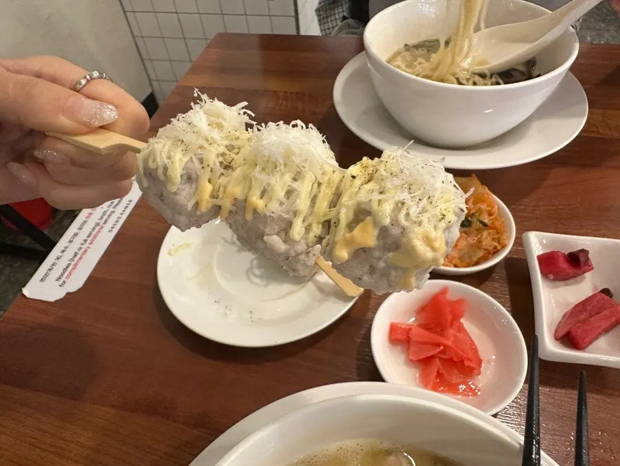 Close-up of a moist chicken meatball skewer
