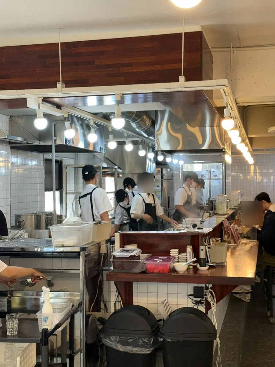 Counter seating at Oreno Ramen Gangnam with a view of the kitchen