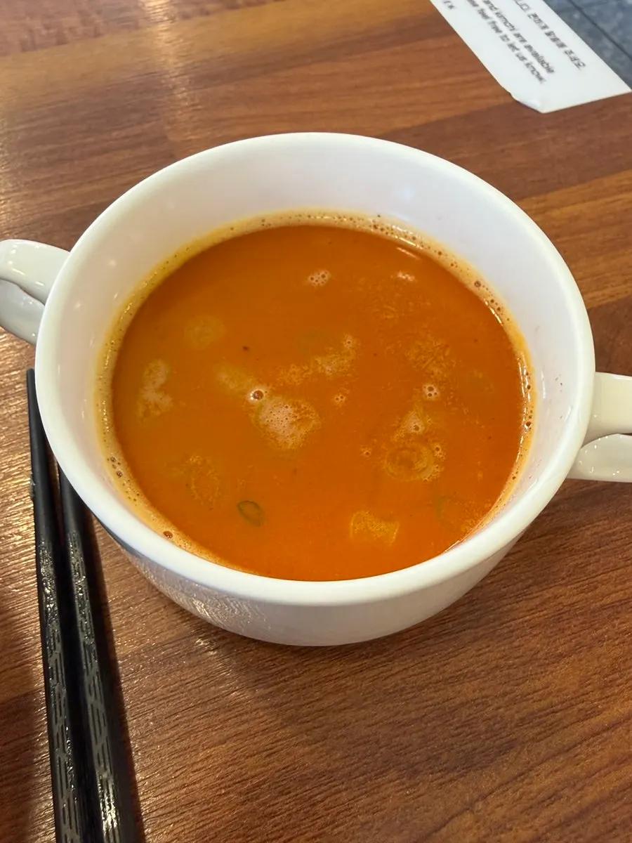 Table with the soft-boiled egg and ramen together