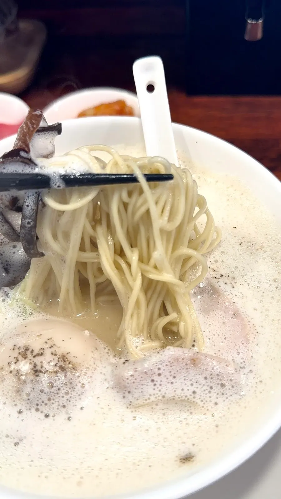 Kimchi served alongside the ramen
