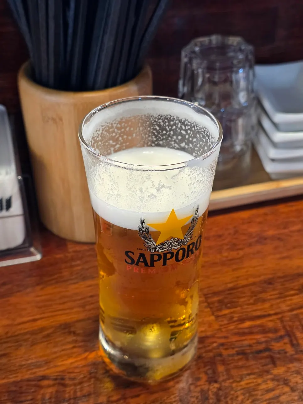 Sapporo draft beer topped with creamy foam