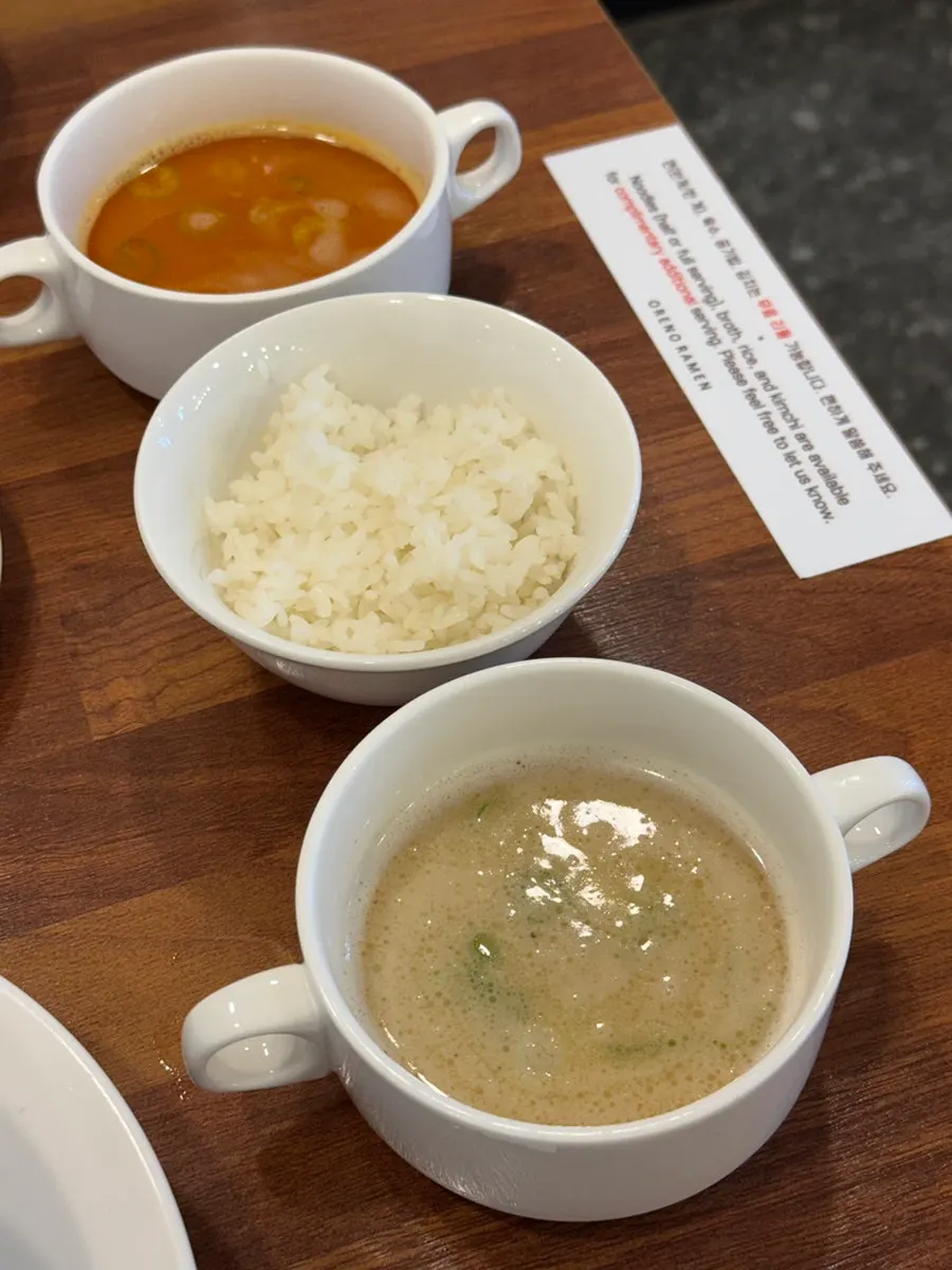 Refilled ramen broth and noodles being eaten