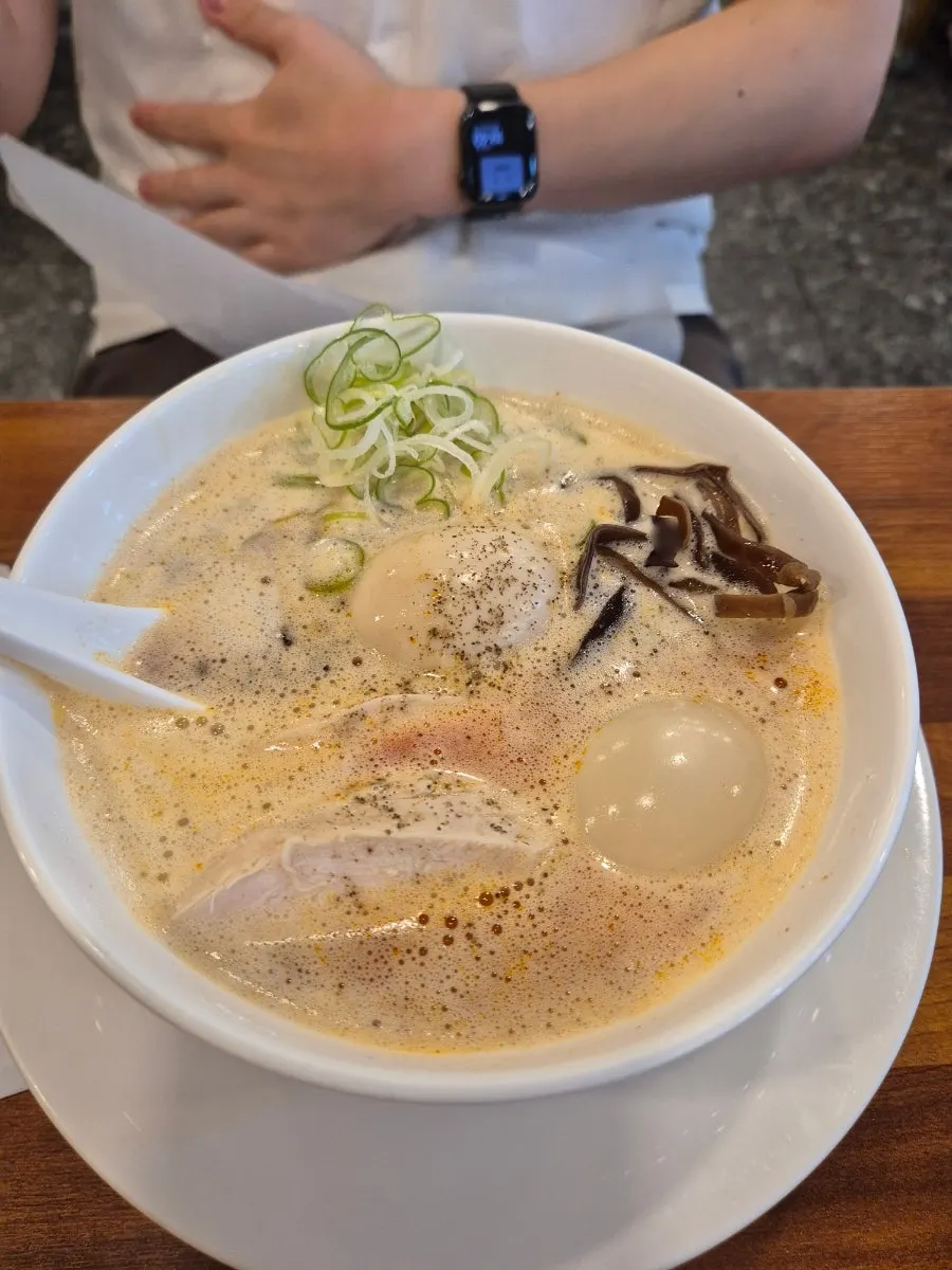 Cross-section of a halved meatball tsukune skewer