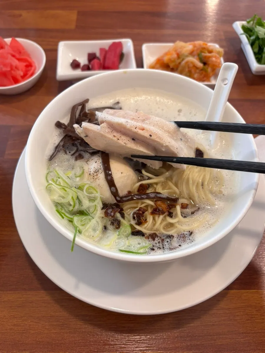 A spoonful of tori paitan broth