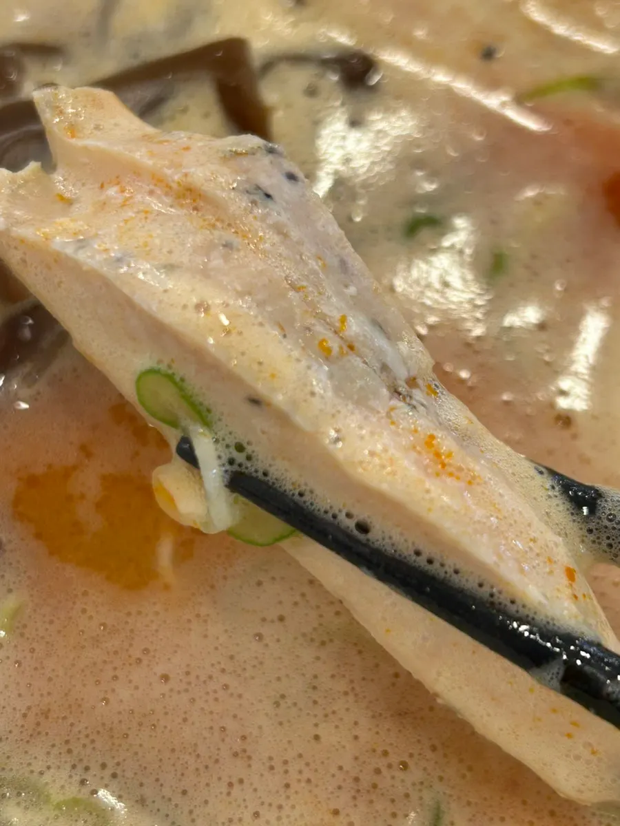 Picking up the chicken breast topping