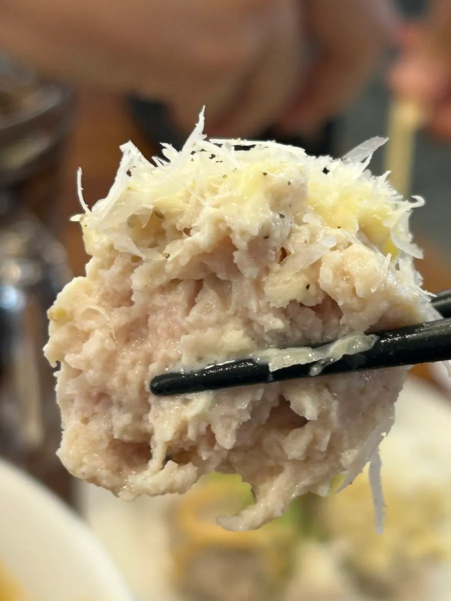 Close-up of tsukune topped with mentaiko