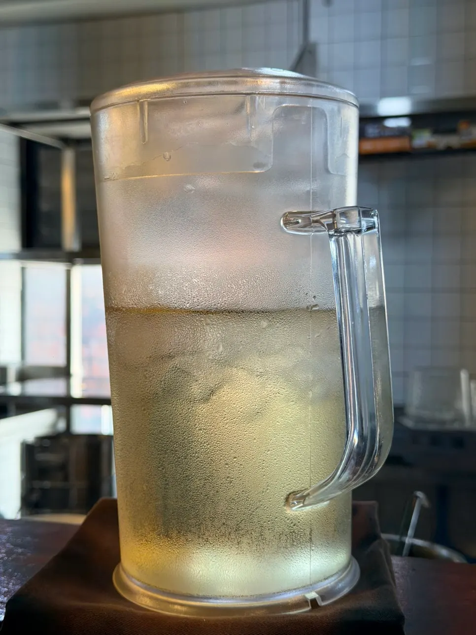 A water cup on the table at Oreno Ramen Gangnam