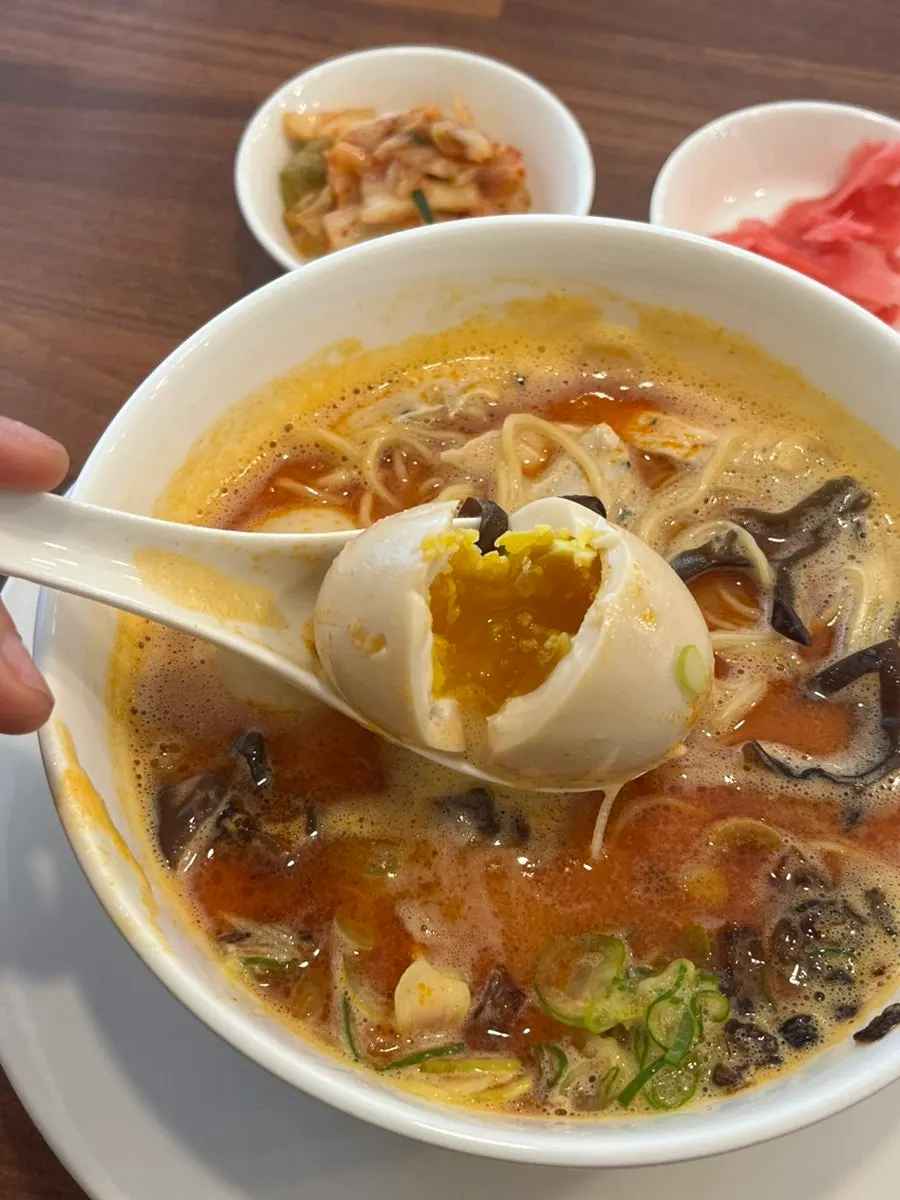 The extra soft-boiled egg ordered