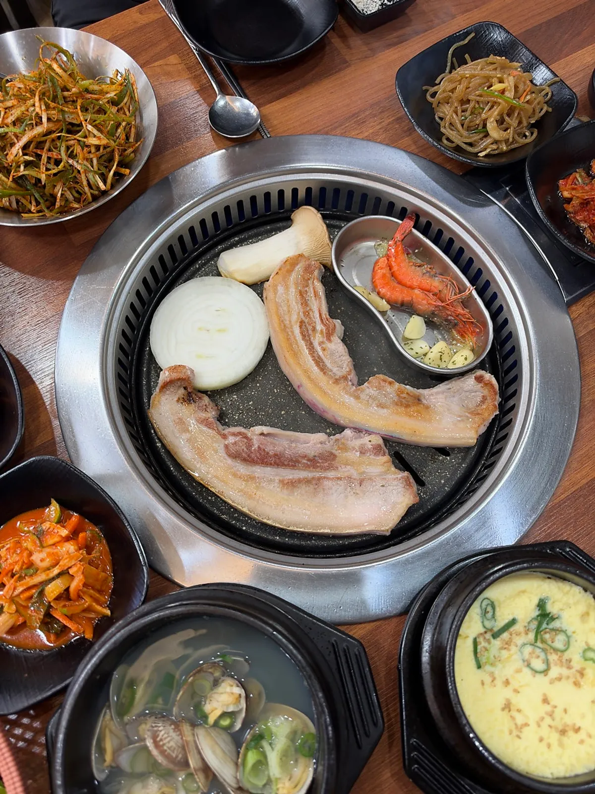 Signature black pork table spread at Oreumak Garden Jungmun Main Branch