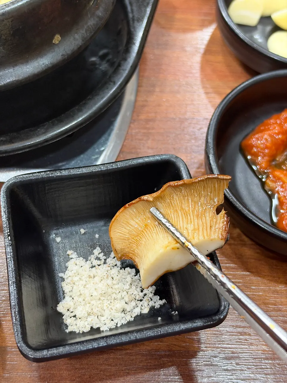 Close-up of fully grilled dry-aged black pork belly