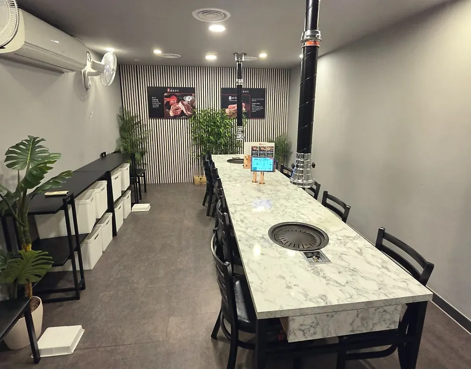Spacious dining hall with table layout at Olheun Gogi Suwon Main Branch