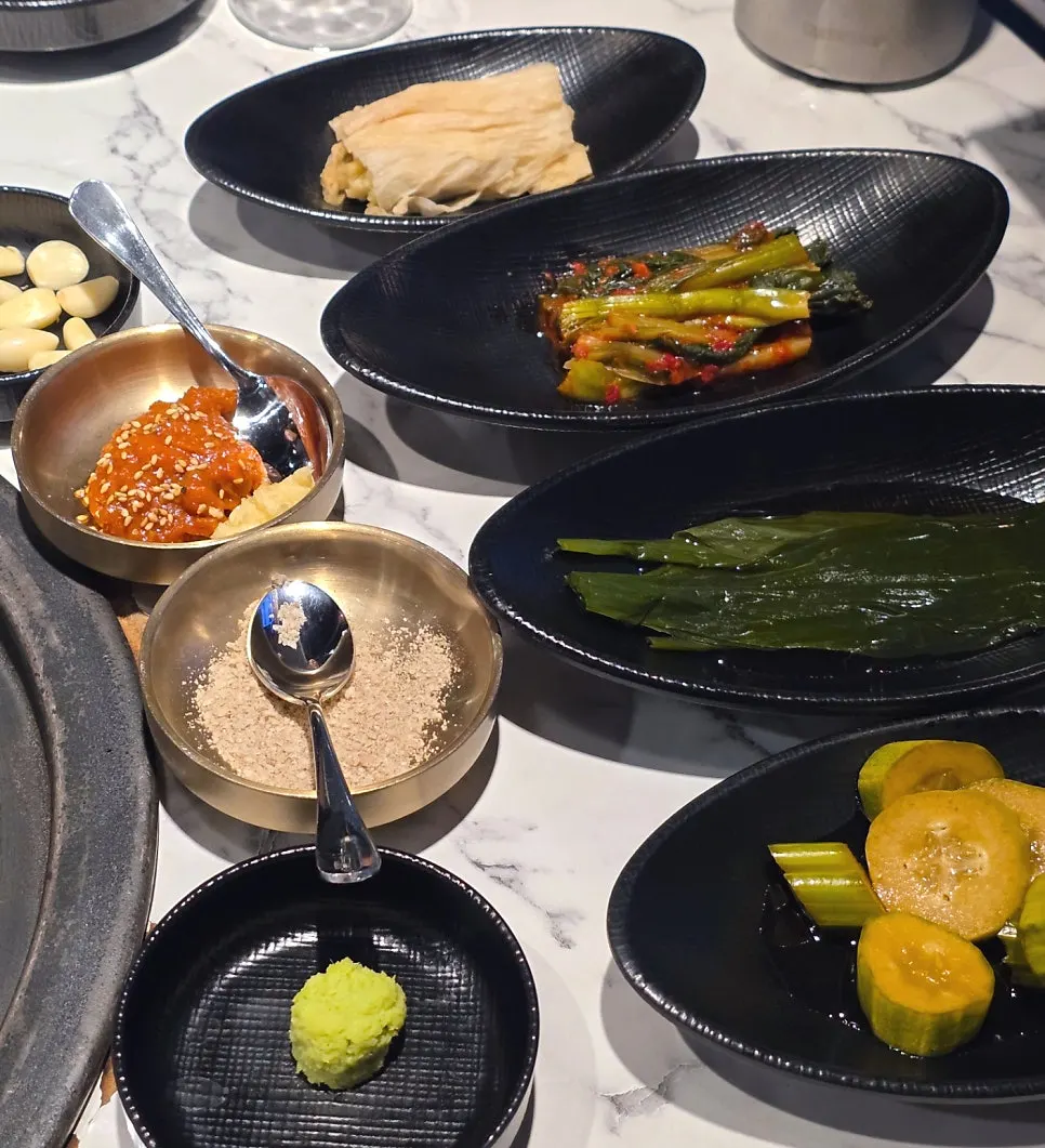 Basic banchan setup with wild garlic leaves and lettuce wraps