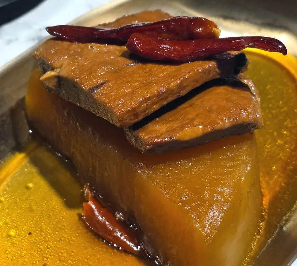 Young radish kimchi, white kimchi, and other banchan from Olheun Gogi