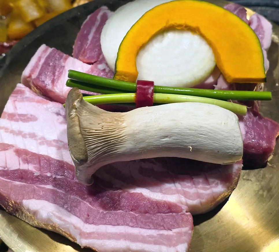 Pork belly and neck meat on the grill