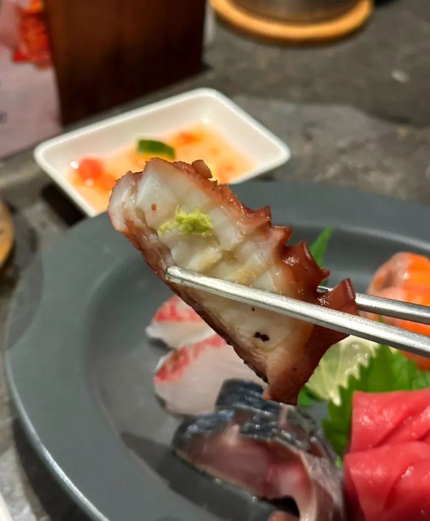 Steamed abalone and boiled octopus in the sashimi platter