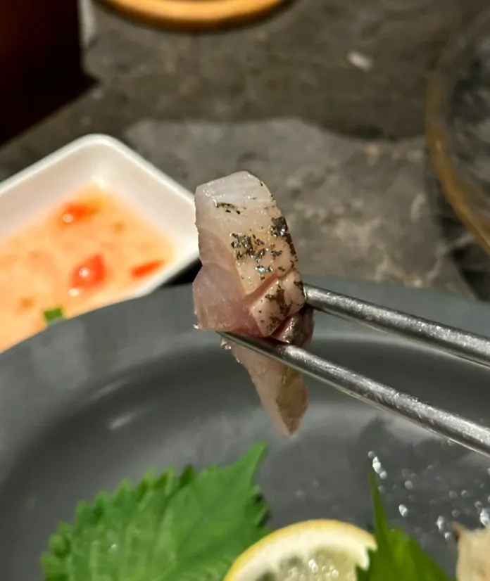 Close-up of horse mackerel and Spanish mackerel sashimi