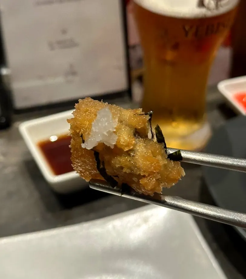 Abalone agemono topped with grated radish and gim flakes