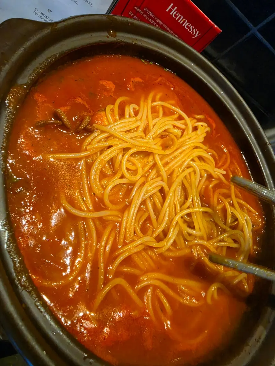 Tomato kaisen nabe filled with seafood and grilled vegetables