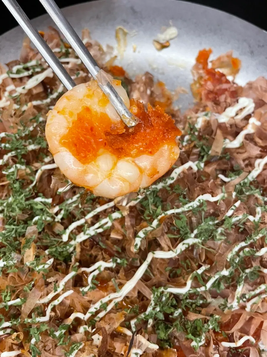 Plate of whole shrimp kimchi okonomiyaki