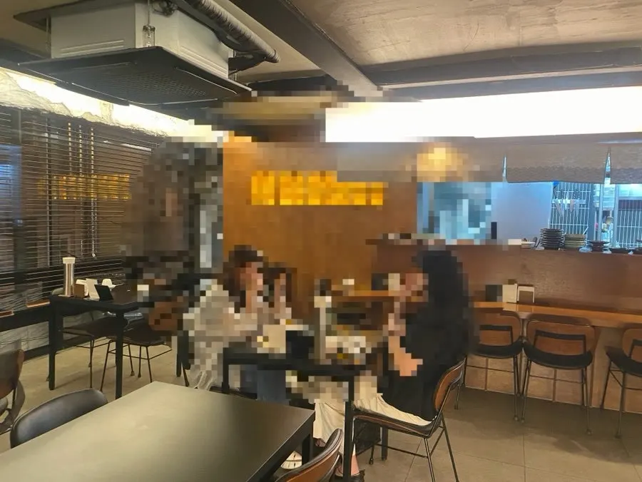 Pub-style interior seating at Orot Silbi