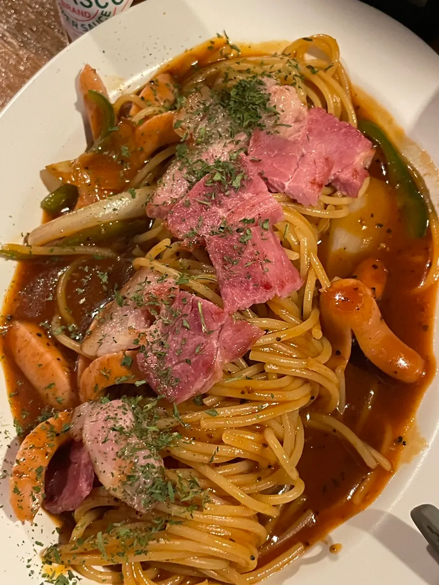 Orot Silbi's Neapolitan pasta topped with whole bacon