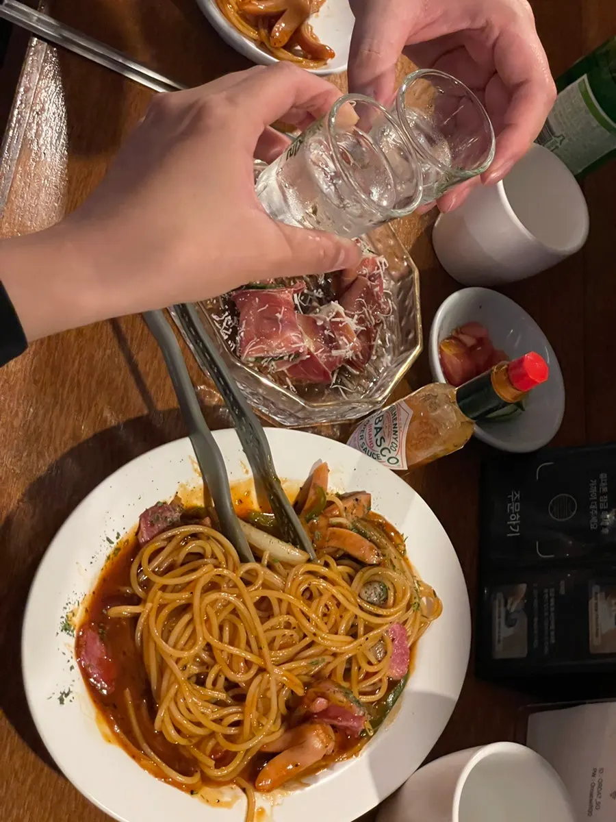 A nearly empty plate of Neapolitan pasta