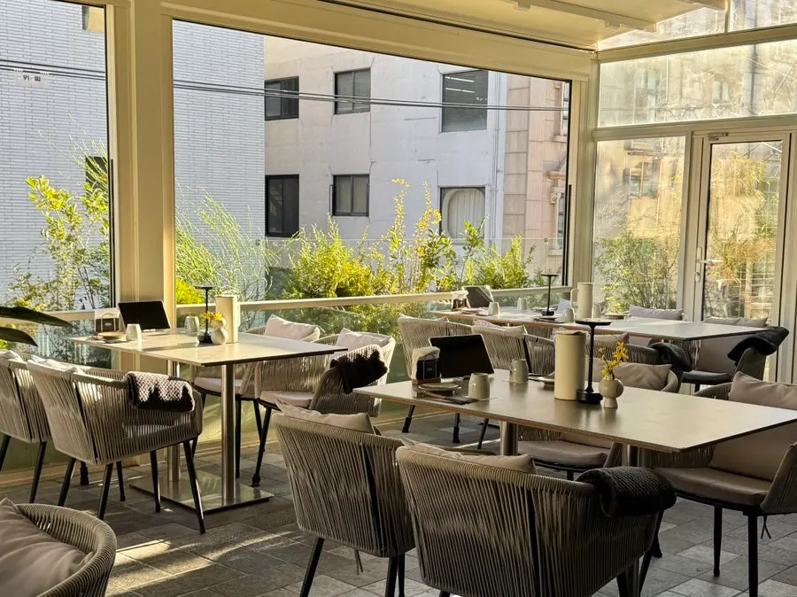 Garden-styled terrace seating at Osa Cheongdam
