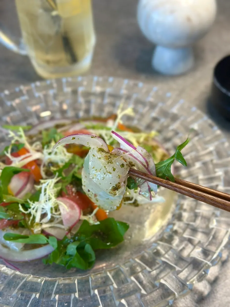 A portion of flounder ceviche taken from the plate