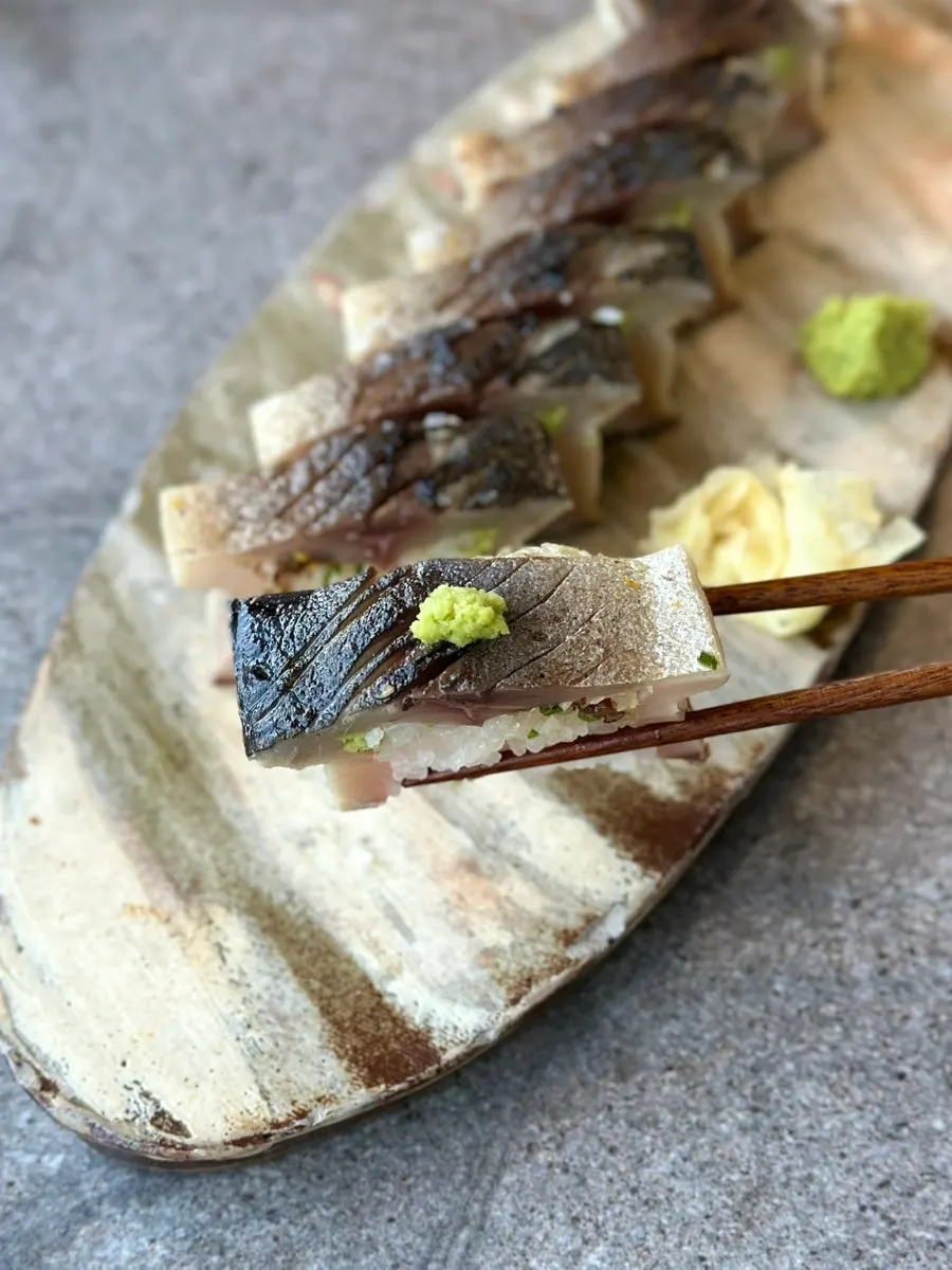 A generous-sized piece of shime saba bouzushi mackerel sushi