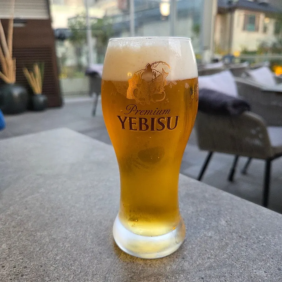 A glass of Ebisu draft beer at Osa Cheongdam