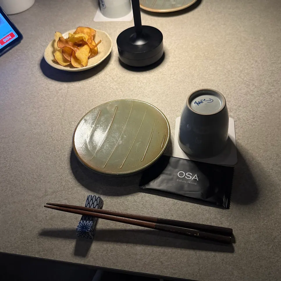 Table set with ceramic small plates and chopsticks