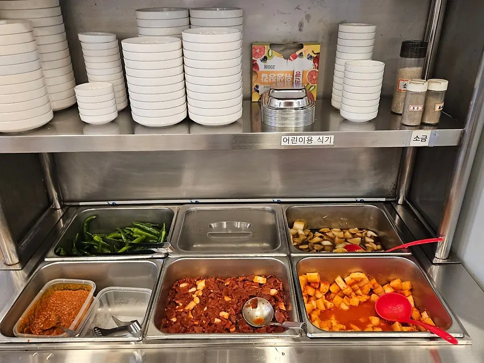 Self-serve bar area with aprons ready for use