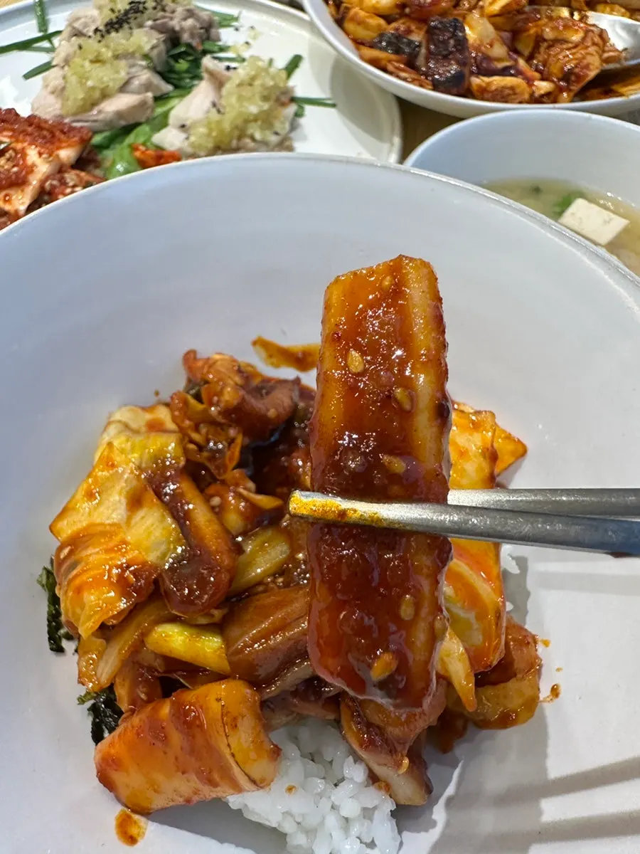 Close-up of sauce-coated stir-fried squid