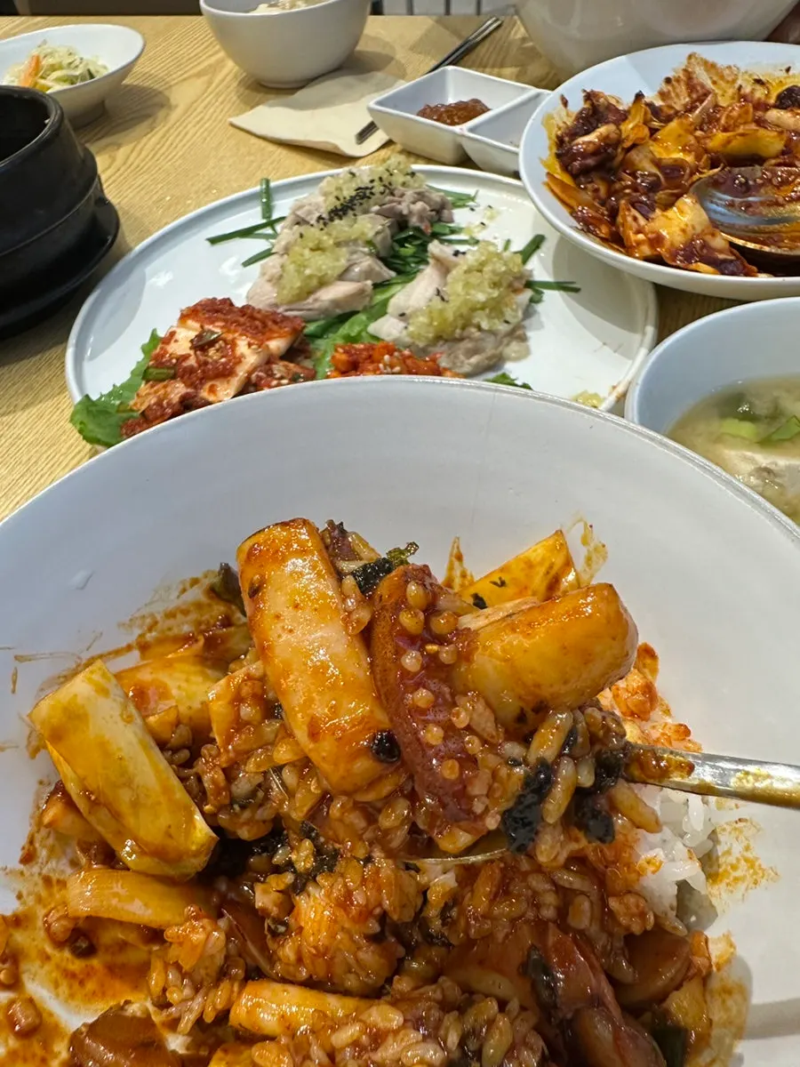 A spoonful of stir-fried squid and rice
