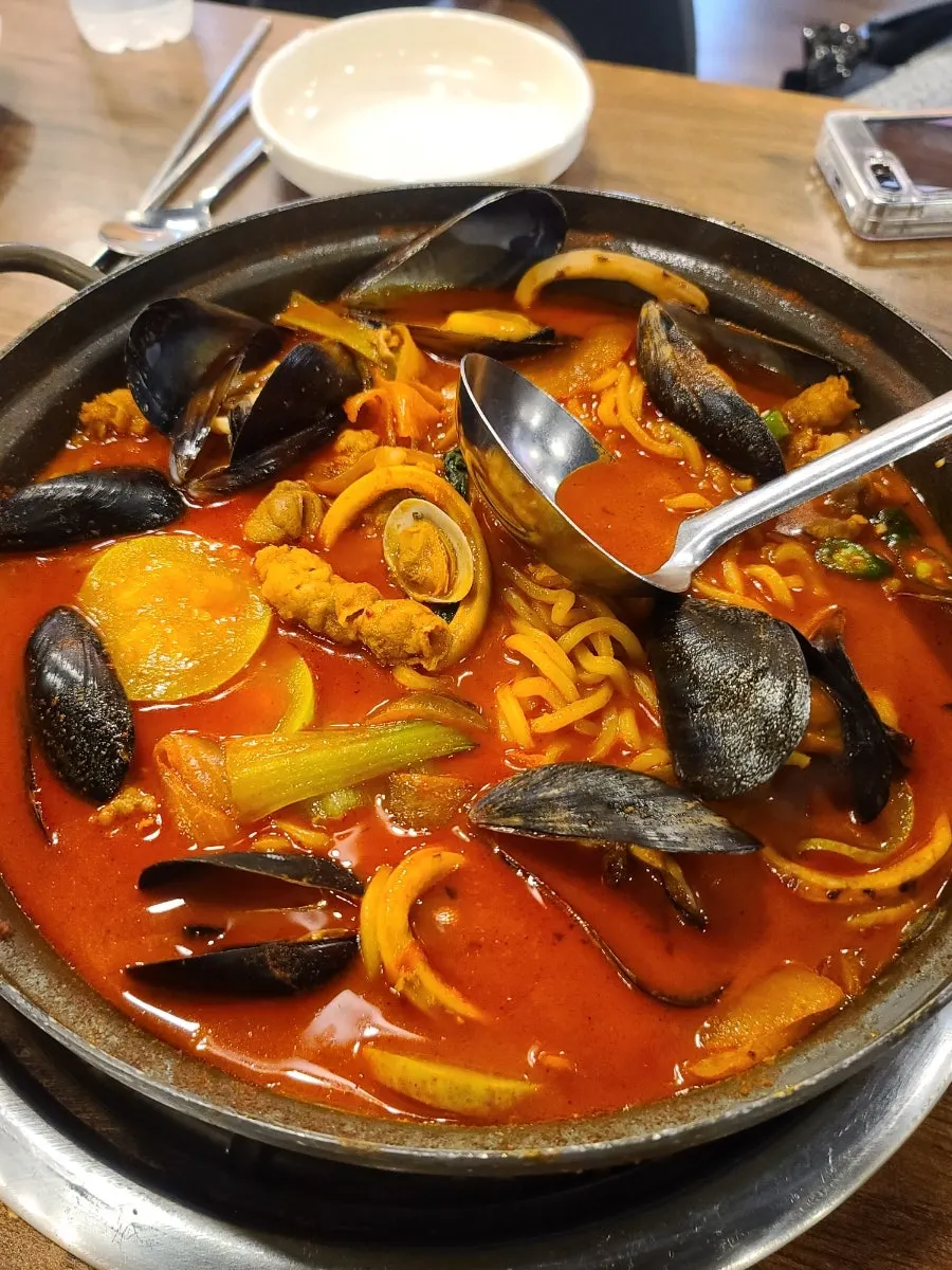 Jjamppong with visible seafood and beef brisket toppings