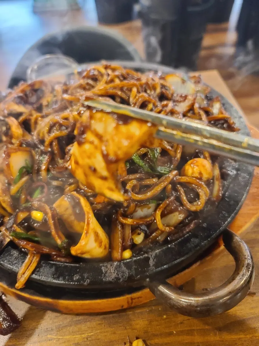 A portion of stone jjajang served out
