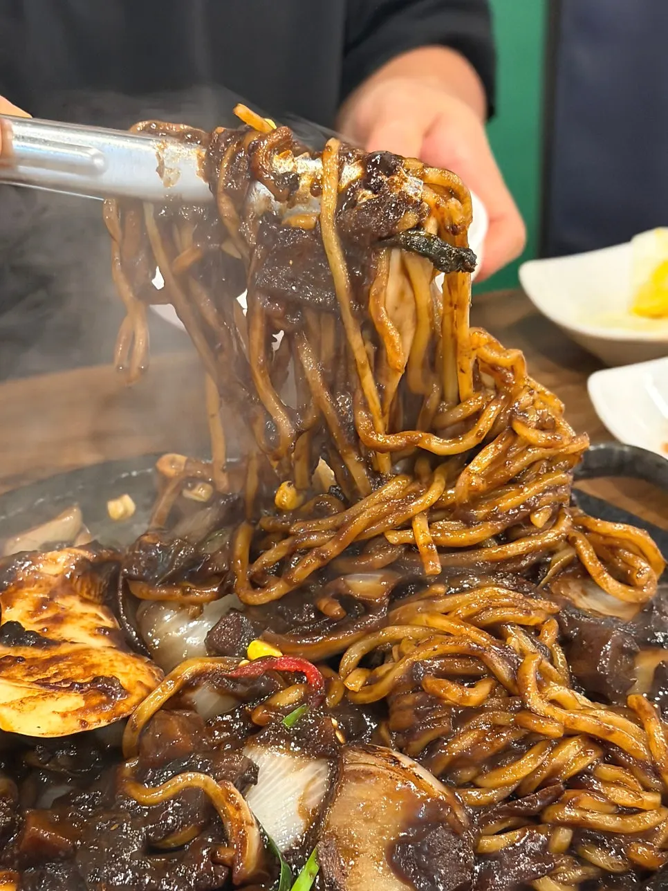 Stone jjajang mixed with seafood and noodles
