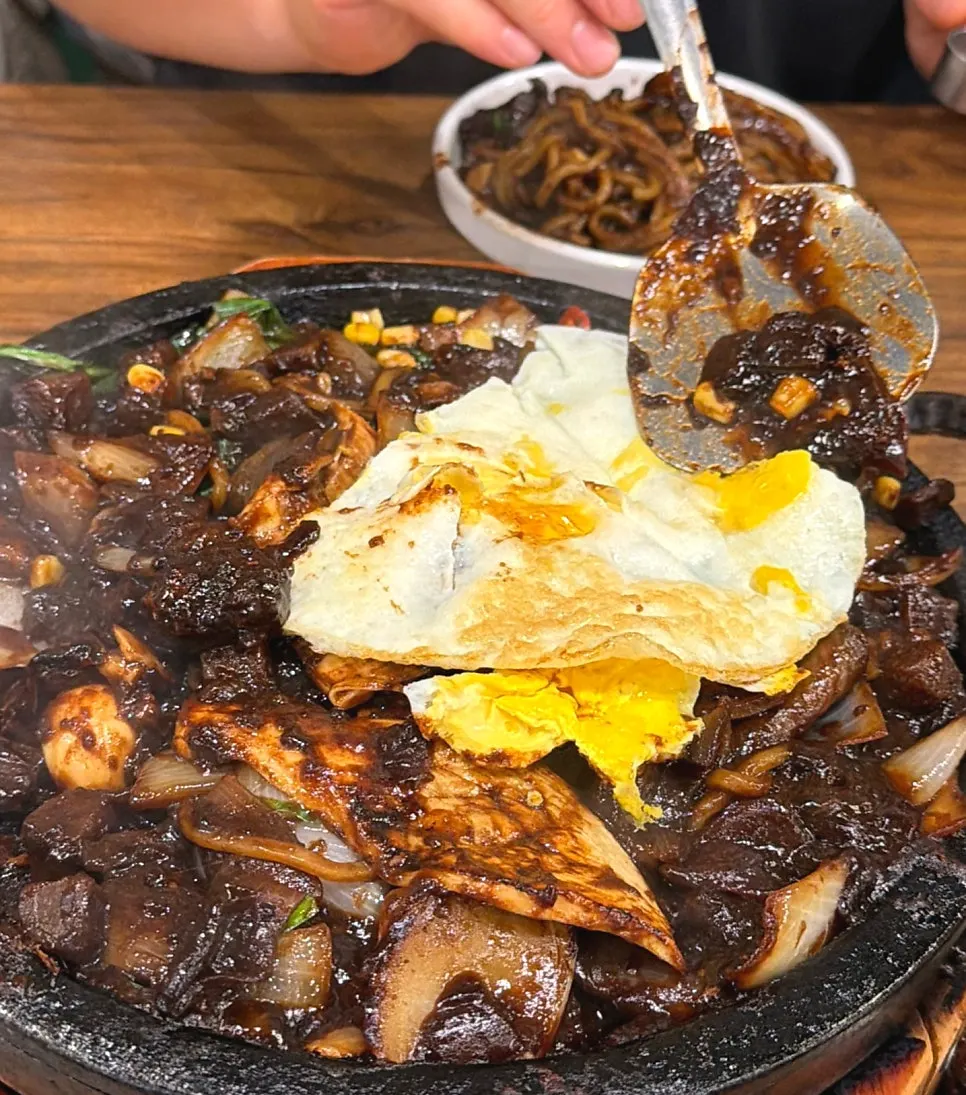 Stone jjajang noodles coated in black bean sauce