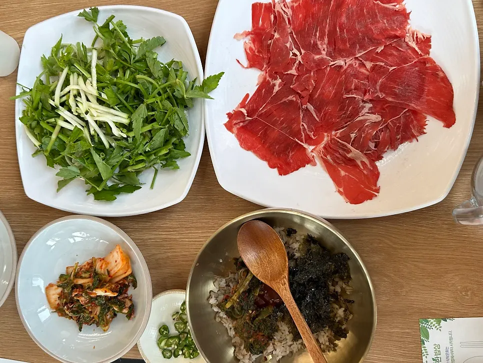 Menu board for Dongchundang's shabu shabu kalguksu
