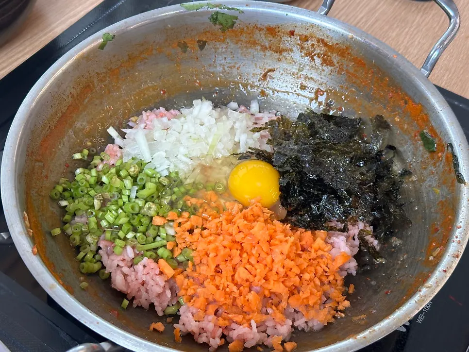 Mugwort kalguksu simmered in the shabu shabu broth