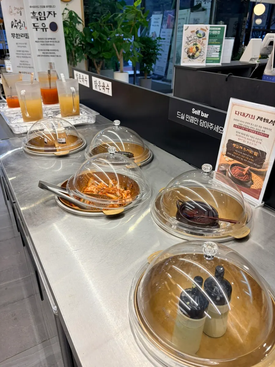 Shabu-shabu broth and self-serve side dishes
