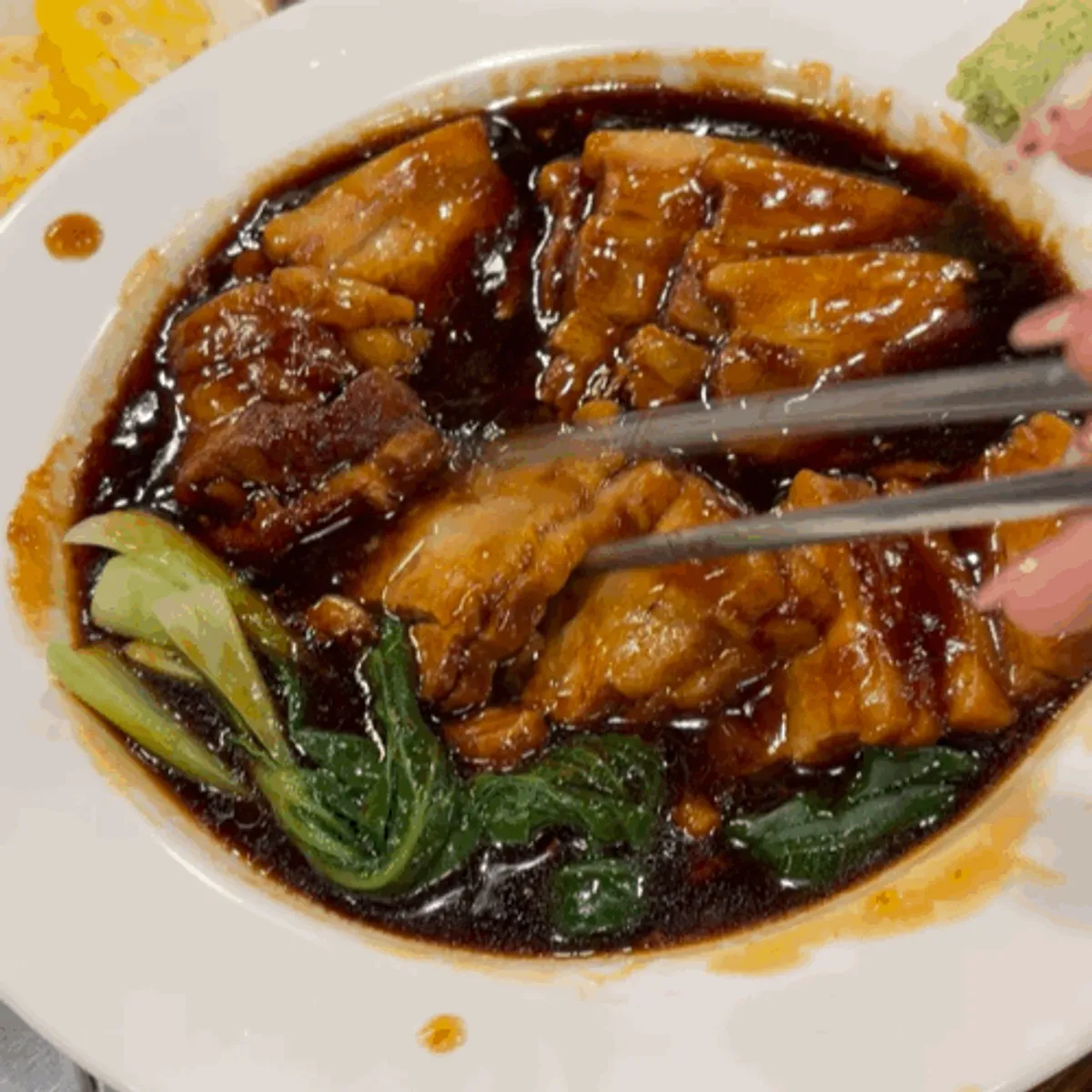 A soft, tender piece of Dami Sik's dongpo pork