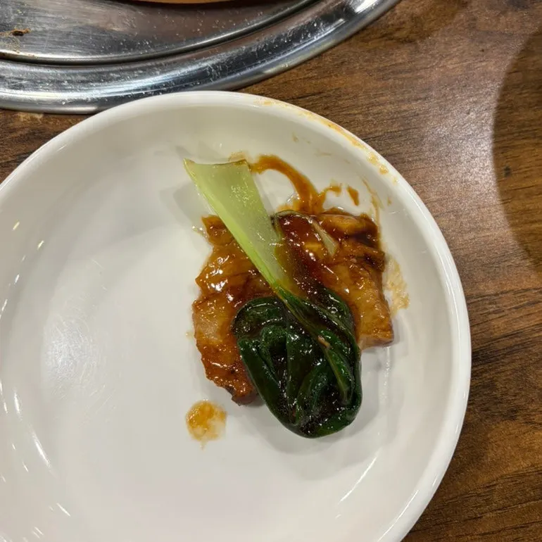 Dongpo pork eaten on top of bok choy