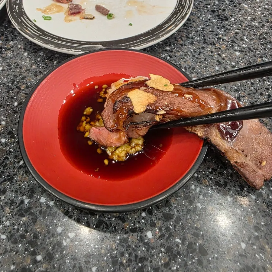 A plate of beef steak sushi