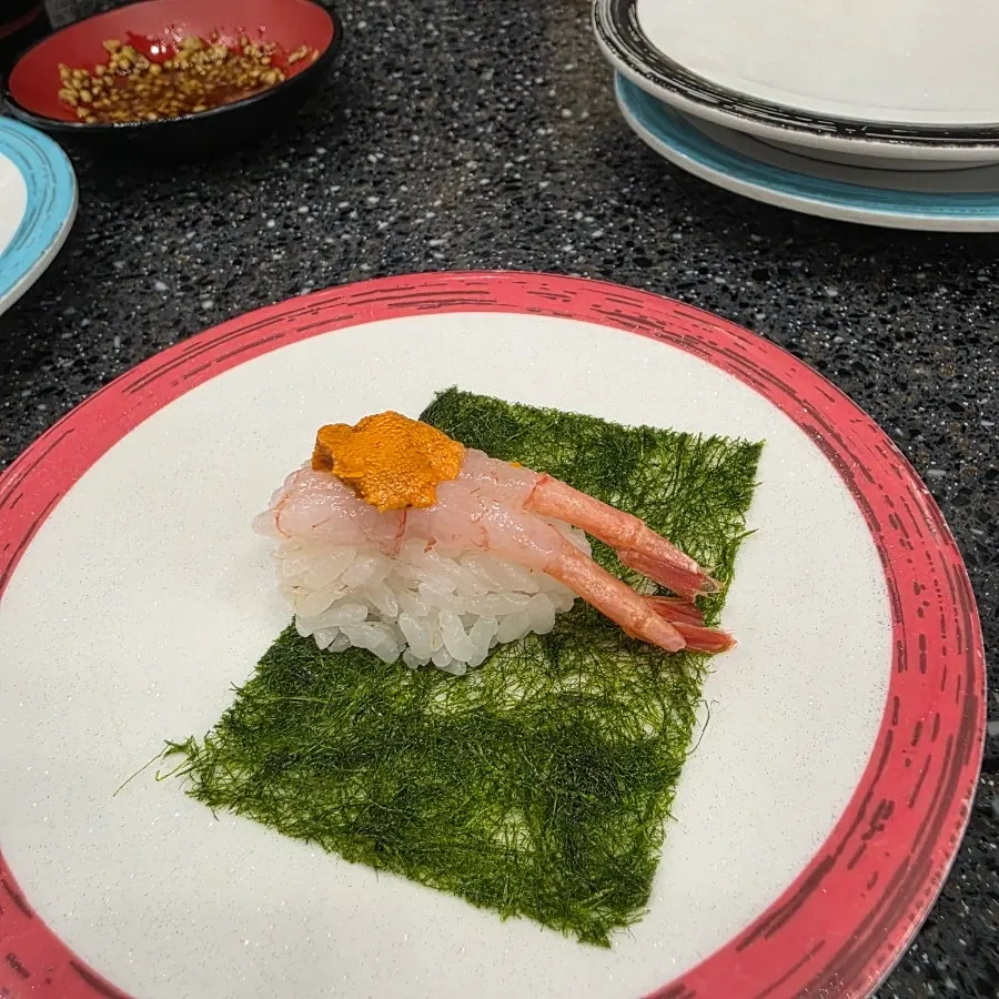 Spicy raw beef sushi with chili-oil aroma