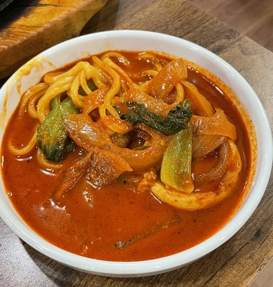 Stone jjajang and jjamppong served together on the table
