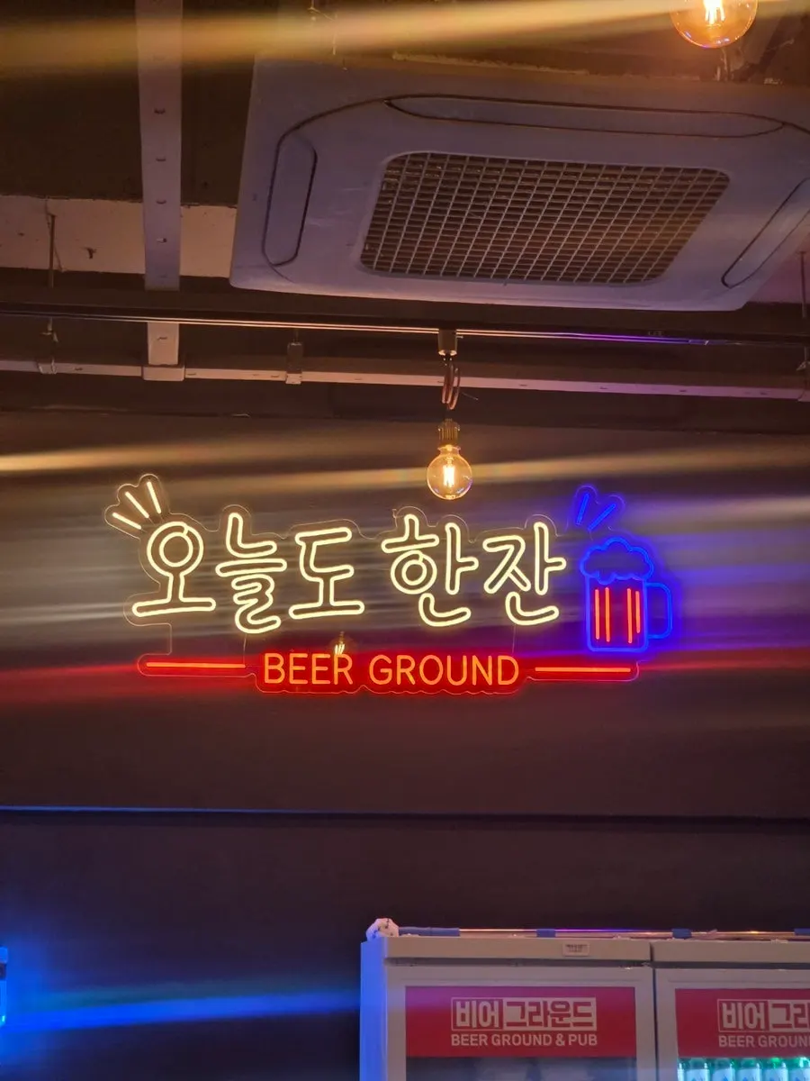 Pub-like interior with neon signs