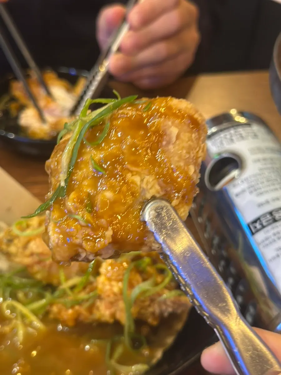 Crispy-battered pa-dak drumstick piece