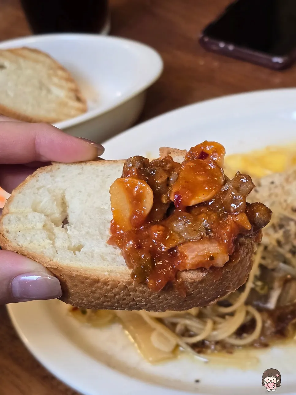 Baguette topped with amatriciana sauce
